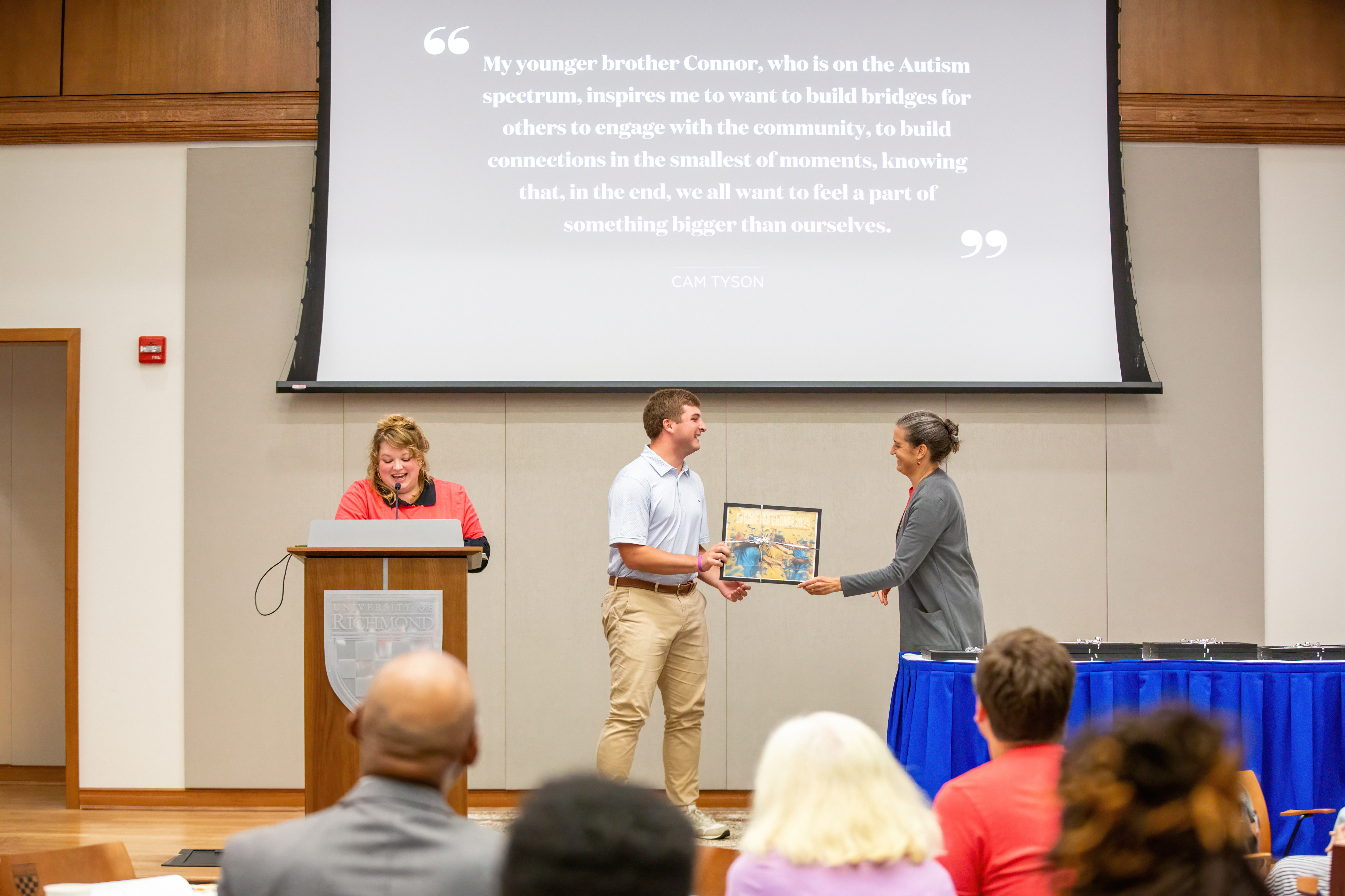 Cam Tyson accepting the Service for Change Award